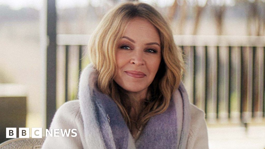 Kylie Minogue reveals she had second cancer diagnosis in 2021