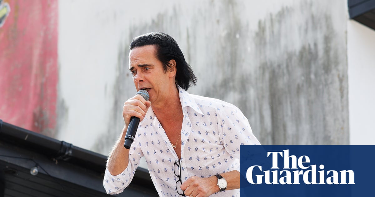 ‘He lived here a long time, so it feels poignant’: Nick Cave thrills Brighton passersby with secret rooftop gig
