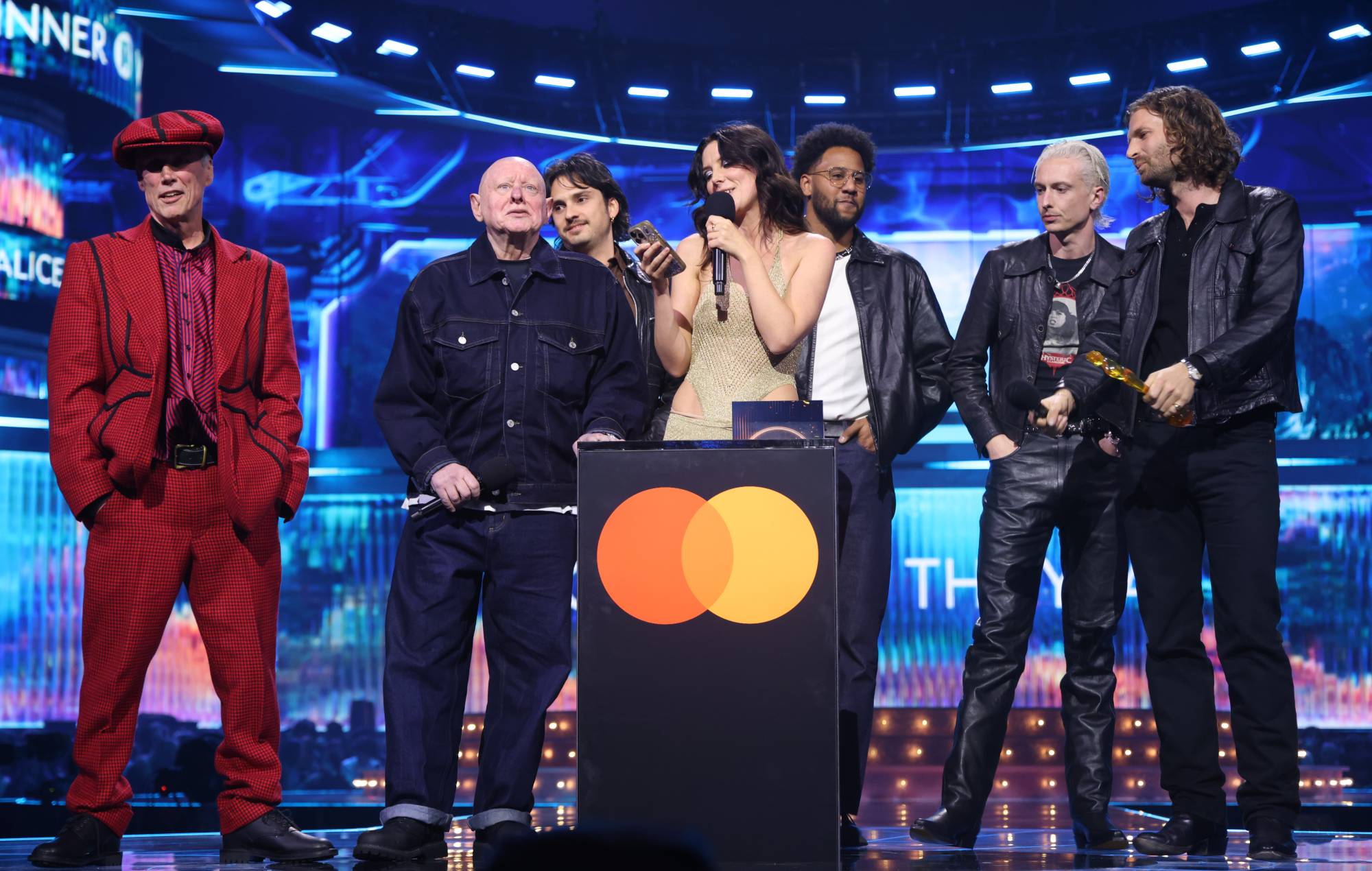 Watch Wolf Alice’s Ellie Rowsell call for support for grassroots music venues in BRITs Best Group acceptance speech