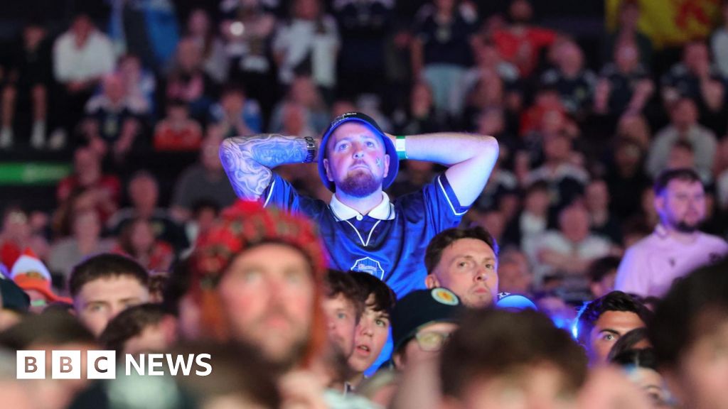 Scotland fans dejected after loss to Morocco