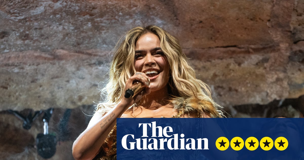 Karol G at Coachella review – electrifying set destined for festival’s hall of fame