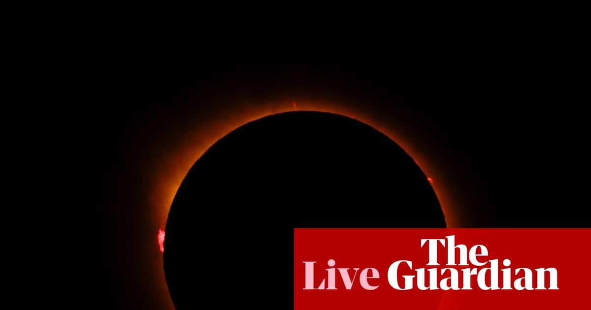 Europe solar eclipse: millions watch rare spectacle across Spain, UK and Iceland – as it happened