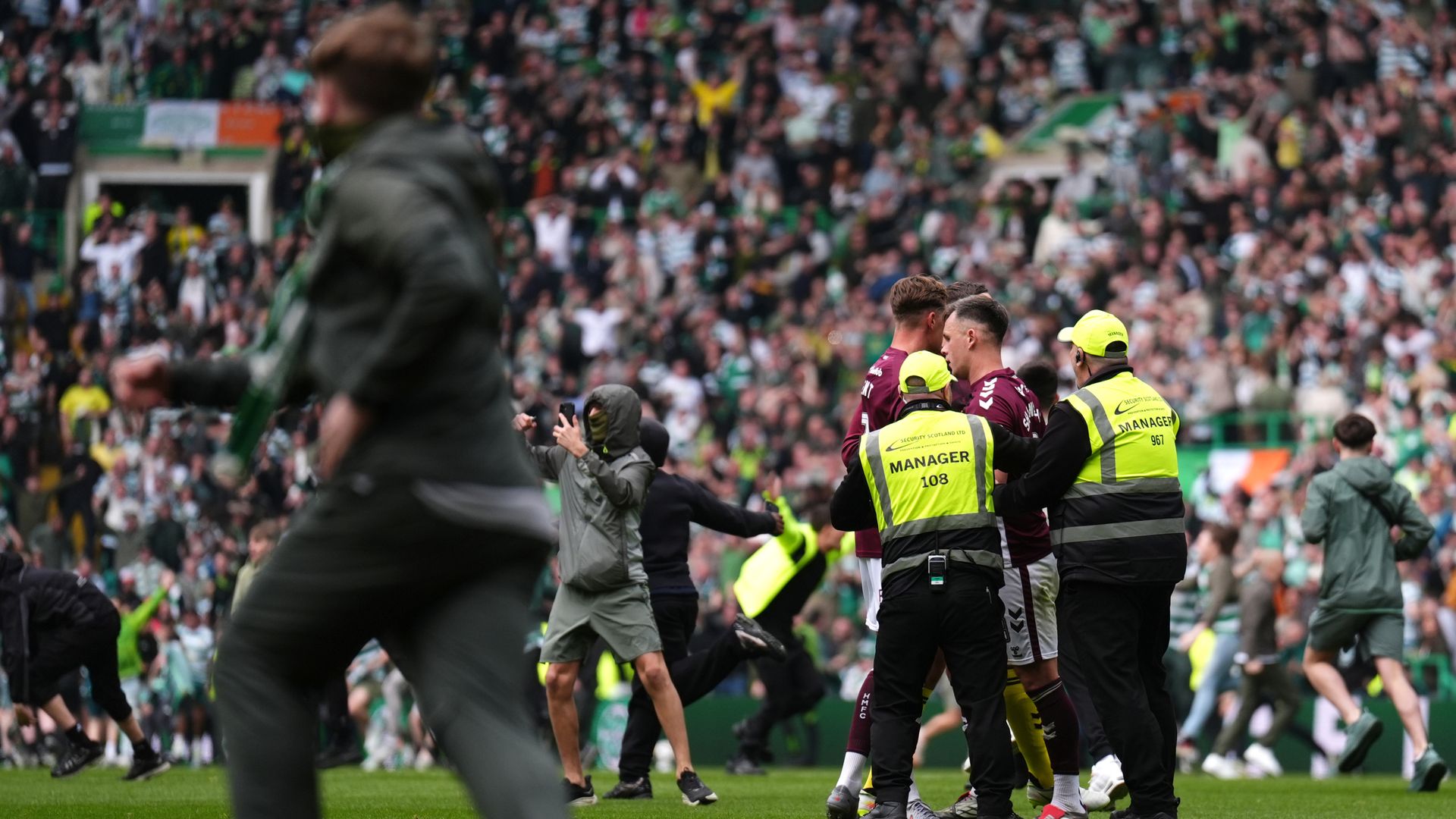 First minister 'open' to criminalising pitch invasions after Celtic fan disorder