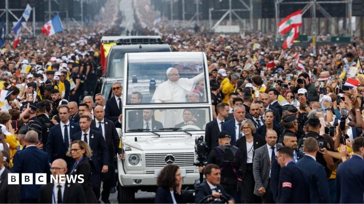 Pope praises 'energy and commitment' of young people as huge crowds join open-air Mass in Paris